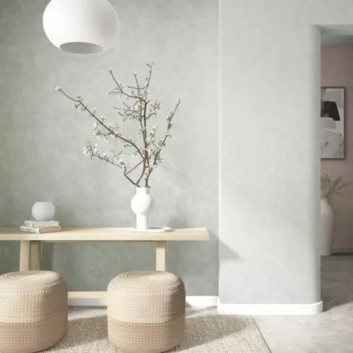 Pasztell zöld színű dekorfestés hatású tapéta – modern strukturált falfelület elegáns enteriőrbe