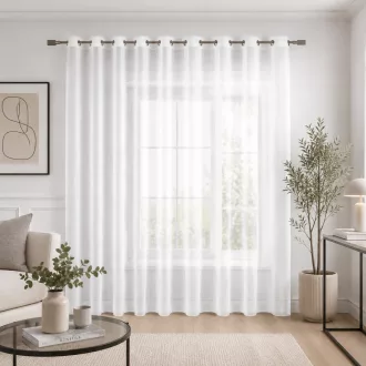   Modern fehér voile készfüggöny fém karikás kivitelben, rúdkarnisra. Könnyed, áttetsző anyaga kellemes természetes fényt enged a helyiségbe, miközben elegáns megjelenést biztosít, 350X250