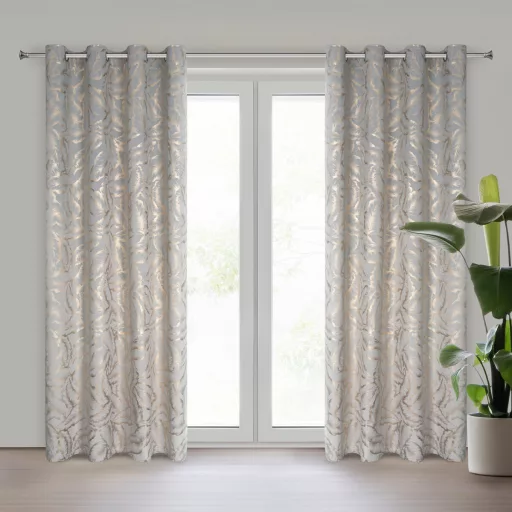 Elegáns levélmintás sötétítő függöny finom arany mintázattal és modern ringlis kialakítással 140X250cm 
