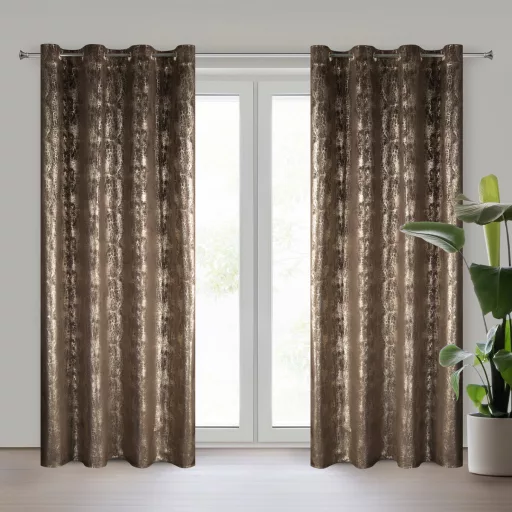 Különleges bronzbarna -pezsgőszínű dekorfüggöny fényes  mintával –fém  ringlivel rúdkarnisra 140X250cm 
