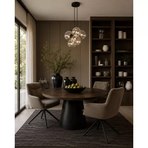 A modern forgószék kényelmes ülőfelülettel,  textilkárpittal  olivazöld színben  és elegáns fekete fém lábakkal 68x62x85x52 cm